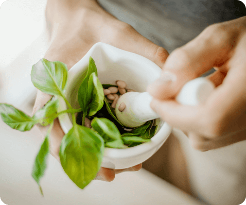 man-making-italian-pesto-sauce