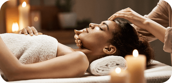attractive-african-woman-enjoying-face-massage-spa-salon (5)