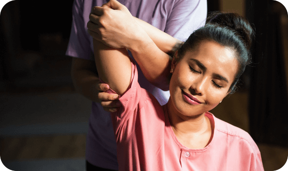 happy-woman-with-pink-hair-standing-against-wall